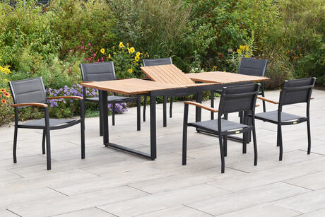 MX Gartenmöbel Paxos 7tlg. Set Stapelsessel gepolstert Graphit/Grau Akazienholz Ausziehtisch 150/200x90cm
